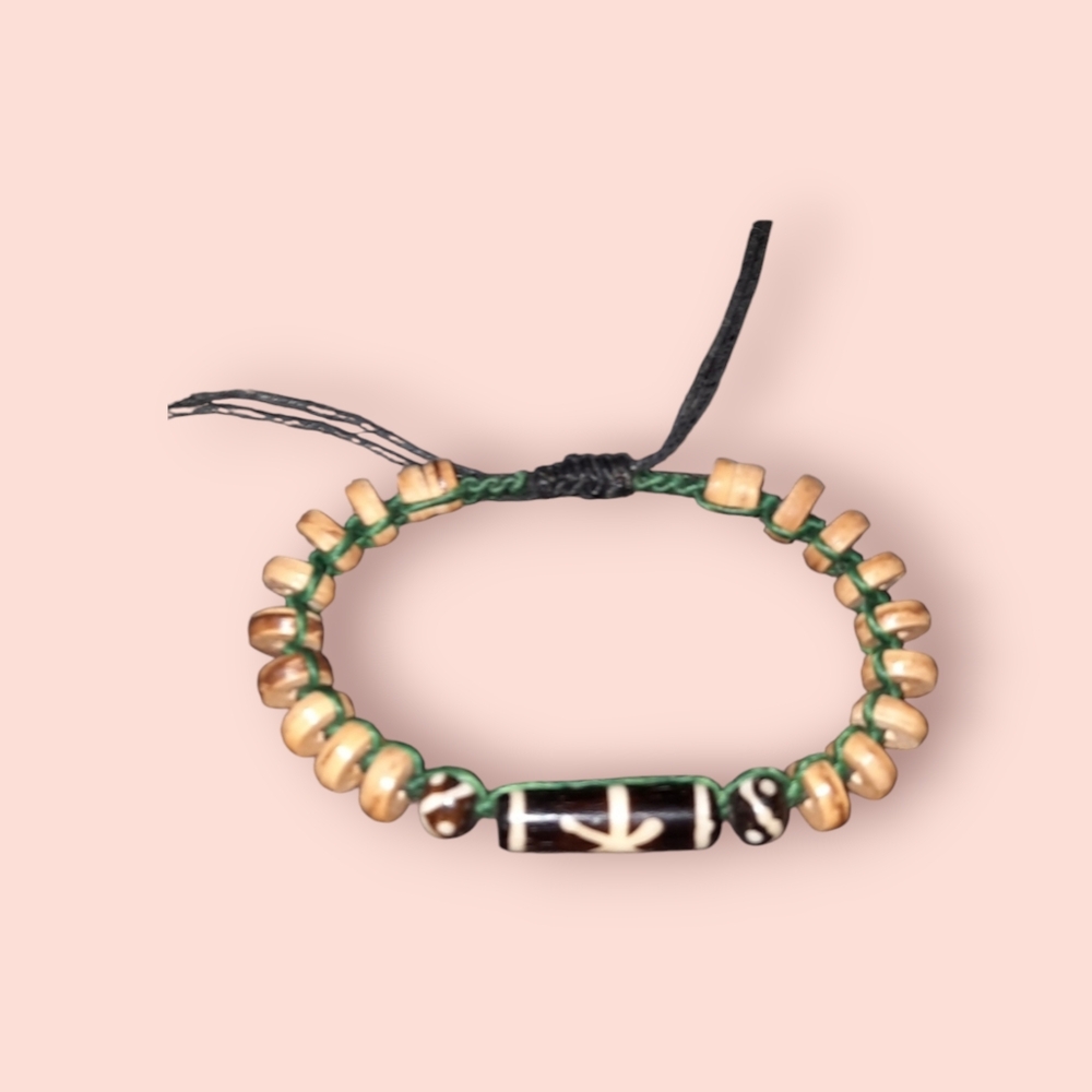 Adjustable wooden boho beaded bracelet on green and brown cord